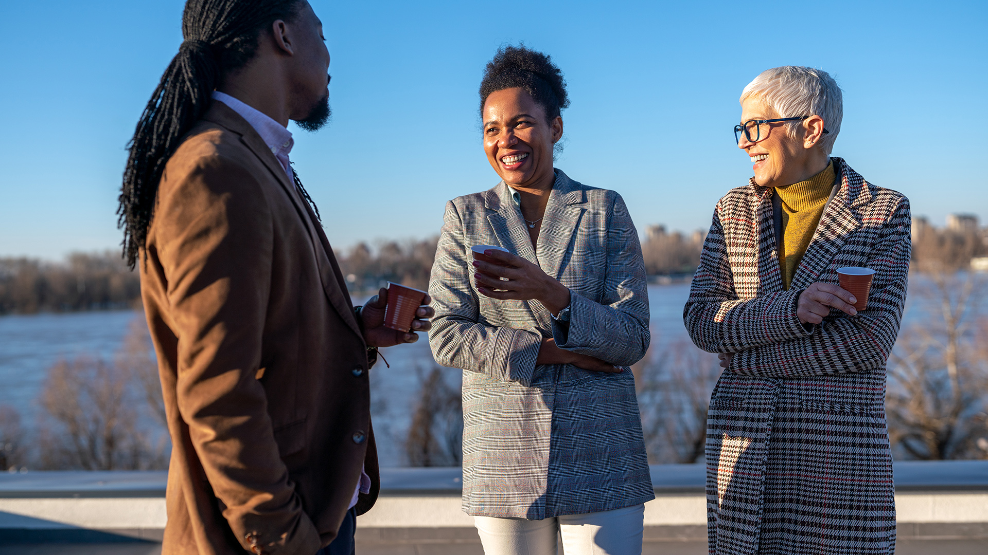 wilbur_0001_mid adult multiethnic business executives enjoy a 2025 01 08 18 20 44 utc